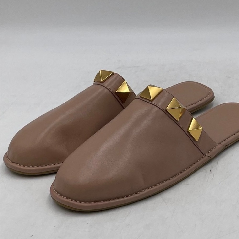 - Valentino Garavani Roman Stud Leather Slippers